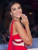 Madalina Ghenea Cleavage and Leggy at “Era Ora” Premiere in Rome