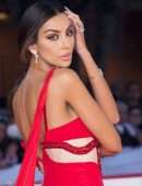 Madalina Ghenea Cleavage and Leggy at “Era Ora” Premiere in Rome