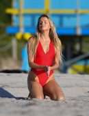 Louisa Warwick in Red Swimsuit for a Photoshoot in Miami