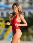 Louisa Warwick in Red Swimsuit for a Photoshoot in Miami