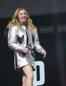 Chloe Moretz Leggy in Silver Jacket at CCXP 22 in Sao Paulo