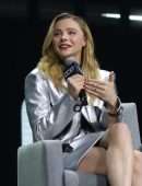 Chloe Moretz Leggy in Silver Jacket at CCXP 22 in Sao Paulo