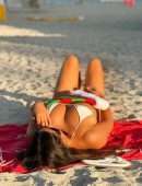 Claudia Romani Flaunts Booty in Thong Bikini