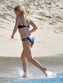 Gwyneth Paltrow with Apple Martin Seen on the Beach in Bridgetown