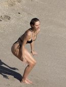 Alexis Ren Booty in Thong Bikini on the Beach in St Barts