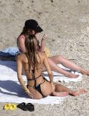 Alexis Ren Booty in Thong Bikini on the Beach in St Barts