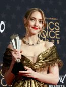 Amanda Seyfried at 28th Critics Choice Awards in Golden Dress in LA