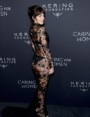 Dakota Johnson in Long Transparent Flowery Gown in Kering Foundation’s Caring for Women Dinner in New York City