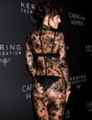 Dakota Johnson in Long Transparent Flowery Gown in Kering Foundation’s Caring for Women Dinner in New York City