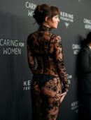 Dakota Johnson in Long Transparent Flowery Gown in Kering Foundation’s Caring for Women Dinner in New York City