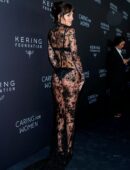 Dakota Johnson in Long Transparent Flowery Gown in Kering Foundation’s Caring for Women Dinner in New York City