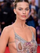 Margot Robbie in a Transparent Dress ,showing cheeks for a Fashion Show IN LONDON