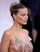 Margot Robbie in a Transparent Dress ,showing cheeks for a Fashion Show IN LONDON