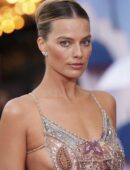 Margot Robbie in a Transparent Dress ,showing cheeks for a Fashion Show IN LONDON
