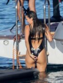 Nina Dobrev in Black Swimsuit in Italy