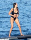 Nina Dobrev in Black Swimsuit in Italy