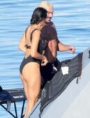 Nina Dobrev in Black Swimsuit in Italy