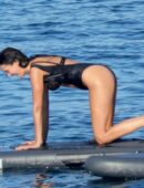 Nina Dobrev in Black Swimsuit in Italy