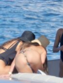 Nina Dobrev in Black Swimsuit in Italy